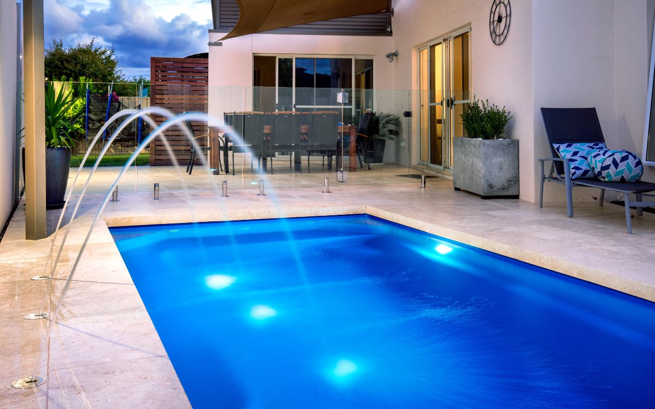 Modern and stylish pool renovation featuring LED lighting and infinity edges.